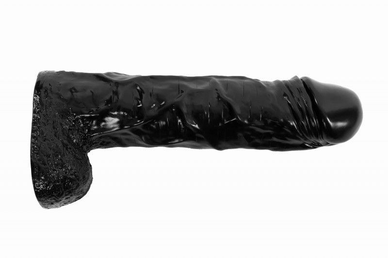 Черный реалистичный фаллоимитатор-гигант - 55 см.